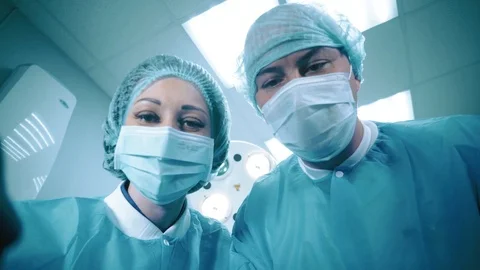 Surgeons in operating room Stock Footage 91906356