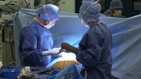 Surgeons in operation Stock Footage 85926045