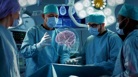 Surgeons Perform Brain Surgery Using Augmented Reality, Animated 3D Brain.  Stock Footage
