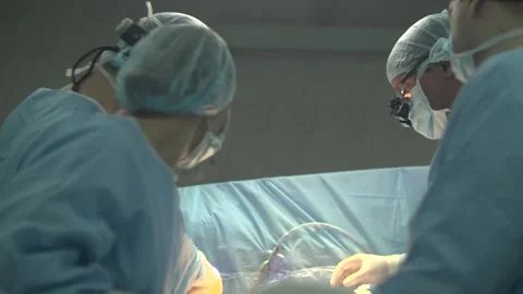 Surgeons perform heart surgery. Stock Footage 312737689