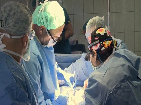 Surgeons perform surgery in operating theater at Honduras hospital 스톡 동영상 100752421