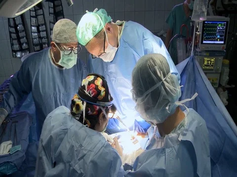 Surgeons perform surgery in operating theater at Honduras hospital 스톡 동영상 100752424
