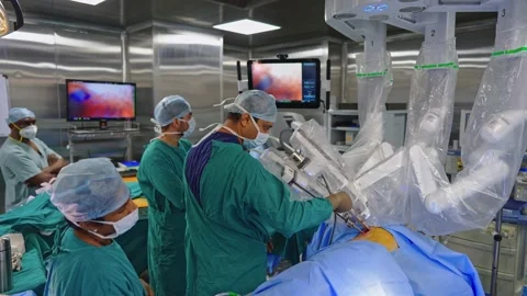 Surgeons perform surgery using a robot Stock Footage 225337201