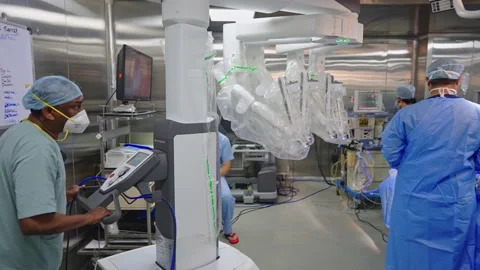 Surgeons perform surgery using a robot Stock Footage 225337217