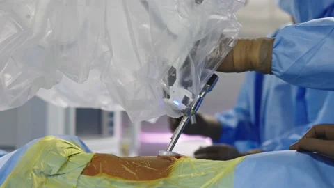 Surgeons perform surgery using a robot Stock Footage 230070993
