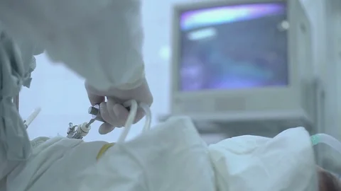 Surgeons performing surgery in operating Theater Stock Footage 73287684