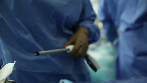 Surgeons preparing their equipment Stock Footage 85931894