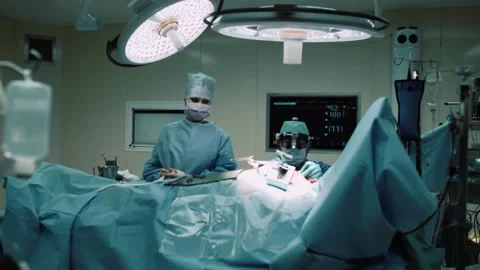Surgeons team work at a modern clinic Stock Footage