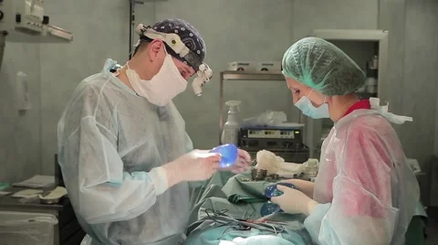 Surgeons Watching implants in Surgery room Stock-Footage 48996258