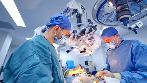 Surgeons working in operating room. Stock Footage 118195955