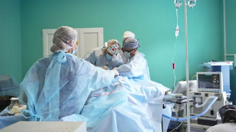 Surgeons working side by side at operation.  Stock Footage 170598838