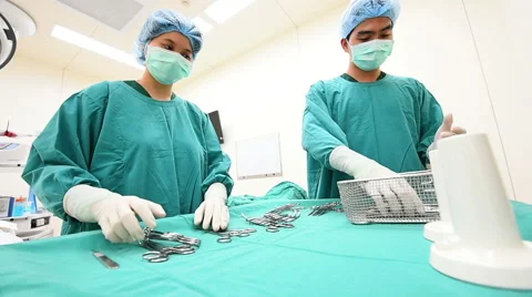 Surgery instruments with a hand Stock Footage 42523646