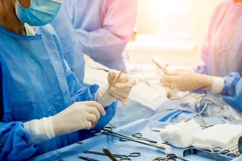 Surgery to remove the breast and replace it with an implant. Stock Photos