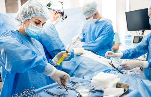 Surgery to remove the breast and replace it with an implant. Stock Photos