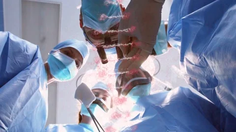 Surgery team leaning over eye under lamp asst placing spatula scalpel cutting Stock Footage 332505210