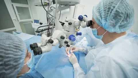 Surgery team making strabismus surgery using modern technologies, latest devices Stock Footage 150671954
