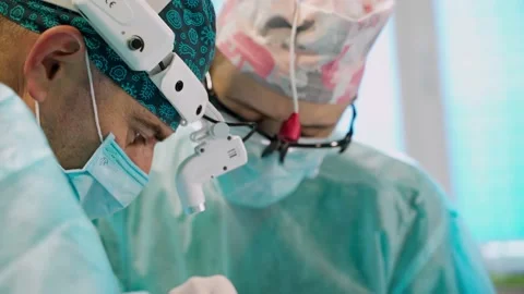 Surgery team in operating room Stock Footage 135604875