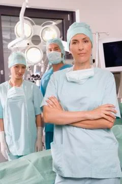 Surgery team in operating room Stock Photos