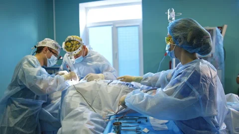 Surgery on thyroid performed by two surgery professionals. Video stock 228142331
