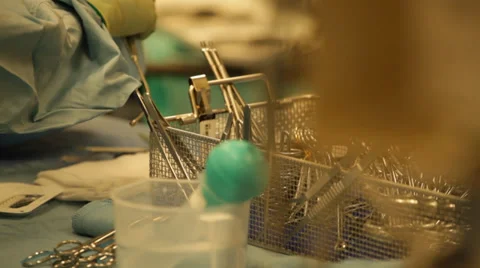 Surgery tools and ongoing surgery Video stock 36435734