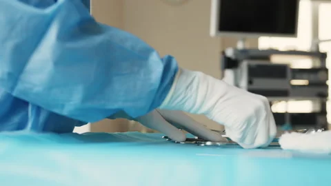 Surgery tools in operating room. Multiple surgery tools on a plate in operating Stock Footage 172371820