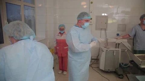 Before surgery. uniform in the operating room. preparation for surgery Stock Footage 135309704