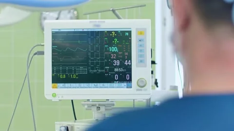 Surgical anesthesia machine in operating room shows indicators of life and pulse Stock Footage 150886135