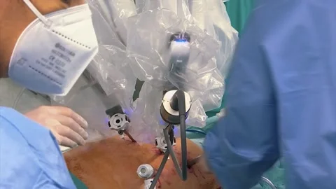SURGICAL DOCTORS PREPARING MACHINE FOR SURGERY Stock Footage 201741625