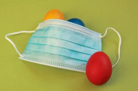 Surgical face mask, 2020 Easter eggs, coronavirus Stock Photos
