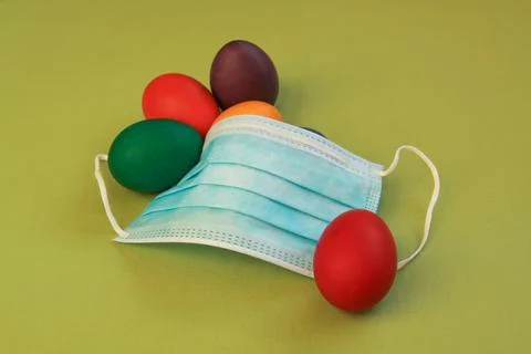 Surgical face mask, 2020 Easter eggs, coronavirus Stock Photos