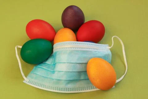 Surgical face mask, 2020 Easter eggs, coronavirus Stock Photos