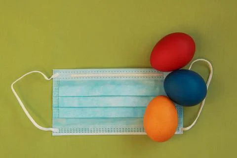 Surgical face mask, 2020 Easter eggs, coronavirus Stock Photos
