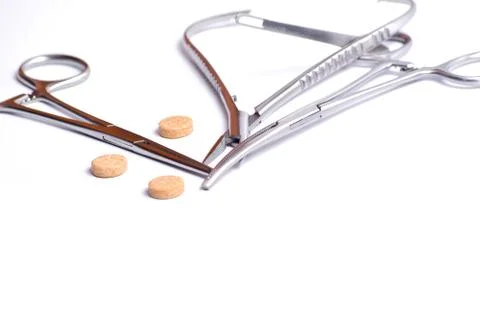 Surgical forceps and tablets Stockfoto's