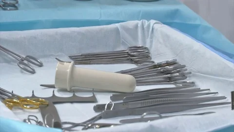 Surgical instruments and tools including scalpels, forceps and tweezers arranged Video stock 81646634