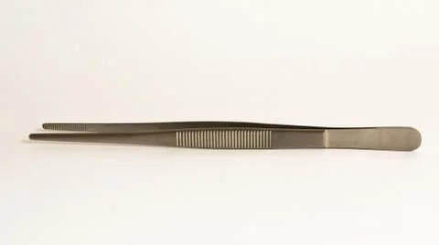 Surgical instruments and tools including , forceps and tweezers White backgro Stock Photos