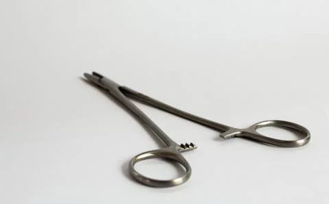 Surgical instruments and tools including , forceps and tweezers White backgro Stock Photos