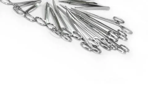  surgical instruments arranged in a pattern 4 surgical Scissors arranged i... Stock Photos