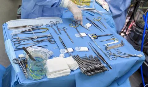 Surgical instruments in operating room on table. Stock Photos