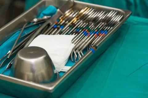 Surgical instruments in the silver tray Stock Photos