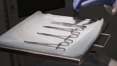 Surgical instruments on the table Stock Footage 159882472