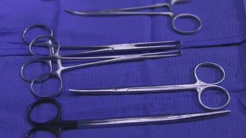 Surgical Instruments on Tray Close Up Move Overhead Stock Footage 171140967