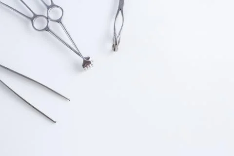 Surgical instruments on white isolated background. top view Stock Photos