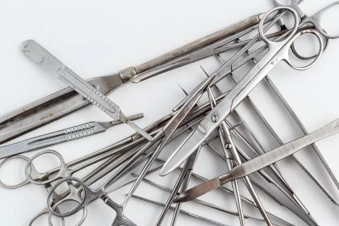 Surgical instruments on white isolated background. top view Stock Photos