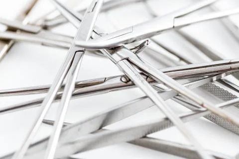 Surgical instruments on white isolated background. top view Stock Photos