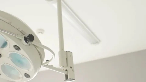 Off surgical lamp in modern operating Stock Footage 82615433