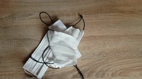 Surgical Mask Dropping On Table Stock Footage 130400919