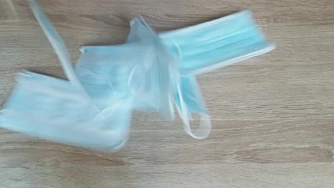 Surgical Mask Dropping On Table Stockbeeldmateriaal 136957559