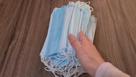 Surgical Mask Dropping On Table Stock Footage 151899878