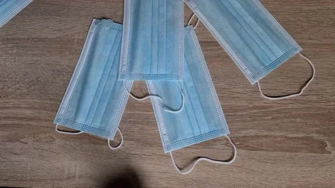 Surgical Mask Dropping On Table Stock Footage 156042015