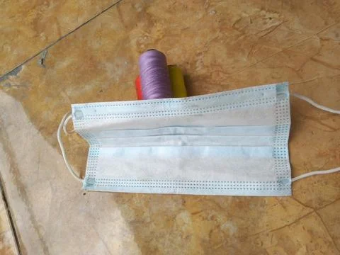 Surgical mask with roll thread Stock Photos